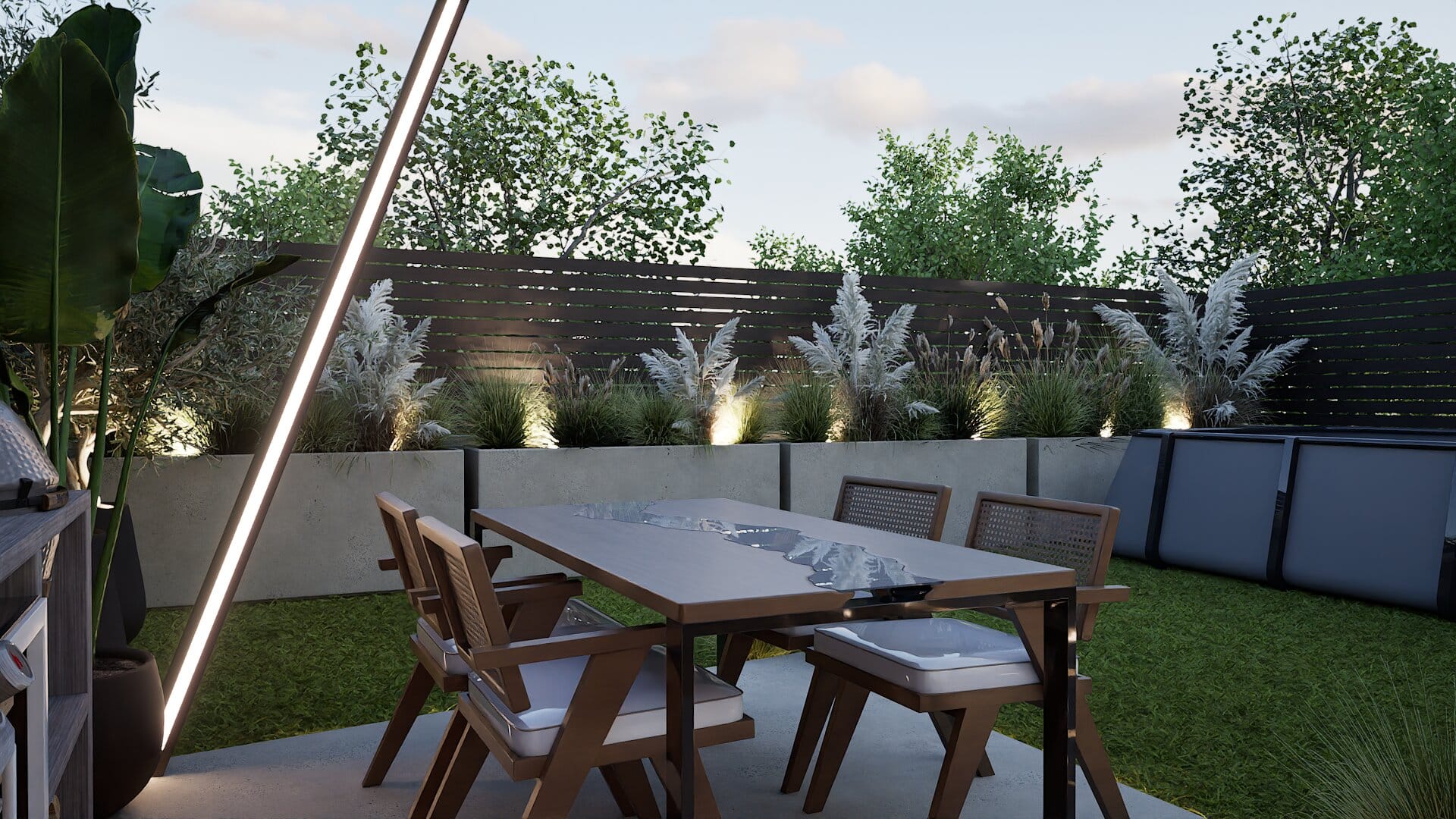 Zona de dining în aer liber, lângă masivele de plante